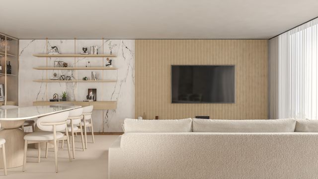Contemporary open-plan living and dining room with a neutral textured sofa, slatted wood feature wall, marble shelving and dining table.